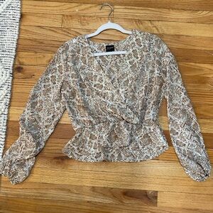 Women’s faux wrap blouse